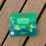 Box of Camo insect repellent patches on a wooden surface.